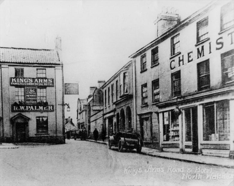 Photograph. Kings Arms St., North Walsham. Oliver's Chemist on the right later became Oliver & Griston, Chemist & Optician after W.W.I. (North Walsham Archive).