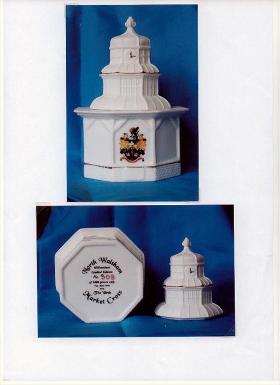 Photograph. Limited Edition Crested Bone-China model of the North Walsham Market Cross produced by the Millennium Committee.....Still available from Mike Ling. (North Walsham Archive).