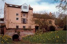 Bacton Wood Mill as a residential house. Norrth Walsham-Dilham Canal. (photo R.M.Ling) Ling collection