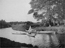 Canoe with sail above Bacton Wood Bridge on North Walsham-Dilham Canal. Ling collection