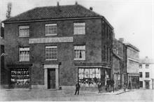 Frisby, Draper. Waterloo House, Market Place, North Walsham