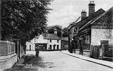 Norwich Road, North Walsham. J.J.Starling on the right, Bull Inn in the distance. Photo taken before Frank Mann built his garage on the far right.
