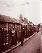 Vicarage Street, North Walsham, showing baker's shop