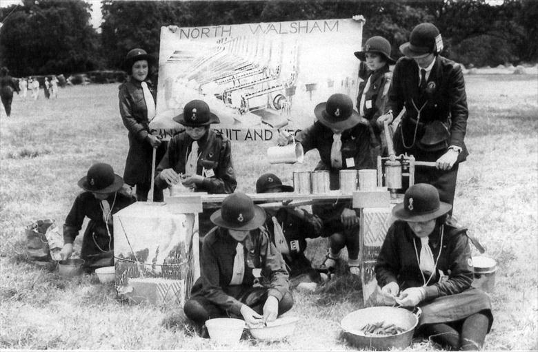 Photograph. 3rd North Walsham Guides at the George V Silver Jubillee Norfolk Guides Rally, Sandringham House. (North Walsham Archive).