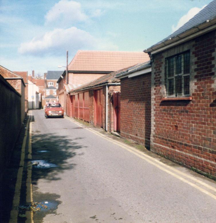 Photograph. Black Swan Loke, North Walsham, looking north. (North Walsham Archive).