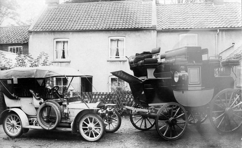 Photograph. Body building - old and new.In Palmer's Yard, next to Frank Mann's Garage, Vicarage Street, North Walsham. (North Walsham Archive).