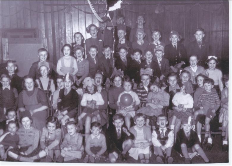 Photograph. Christmas Party for railway workers children. (North Walsham Archive).