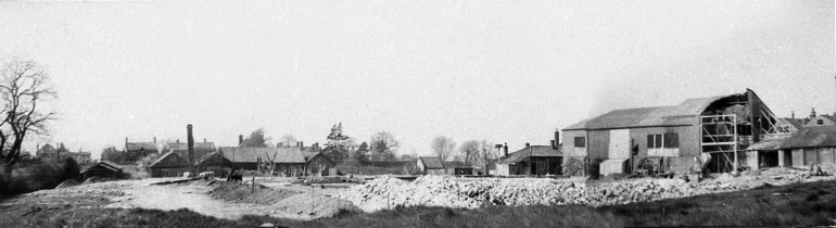 Photograph. Demolition of Cornish & Gaymer's works for new Canning Factory on Norwich Road. (North Walsham Archive).