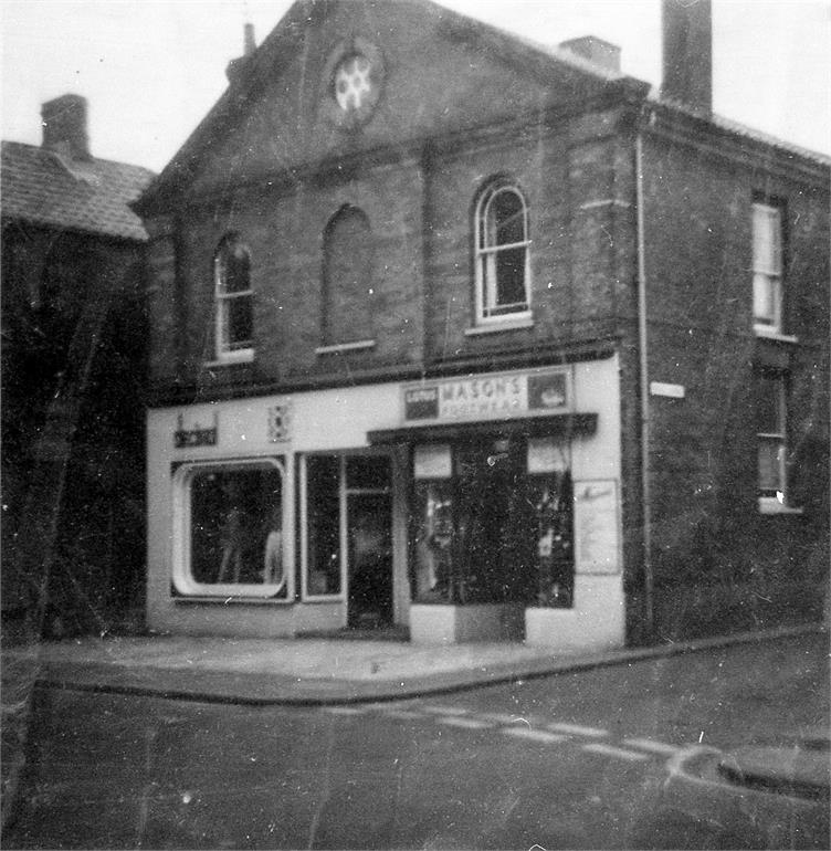 Photograph. Decimal Fashions and Mason's Footware on Church Street (North Walsham Archive).