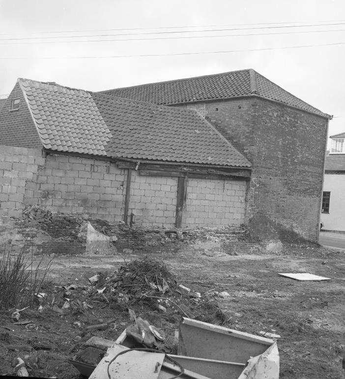 Photograph. Demolition of buildings on corner of Mundesley Road and Vicarage Street (North Walsham Archive).