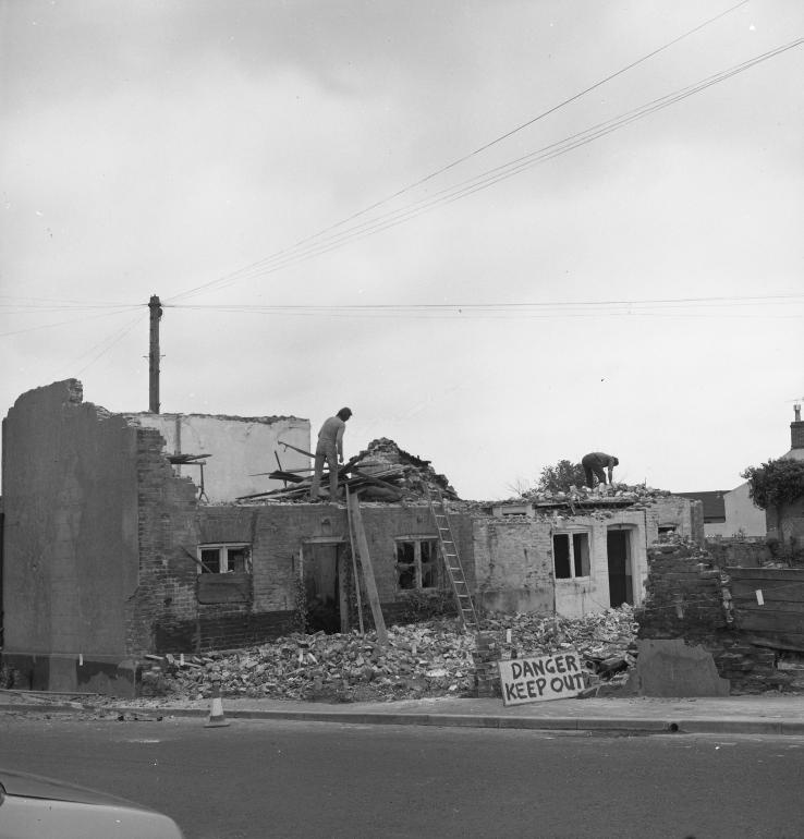 Photograph. Demolition of buildings on corner of Mundesley Road and Vicarage Street (North Walsham Archive).