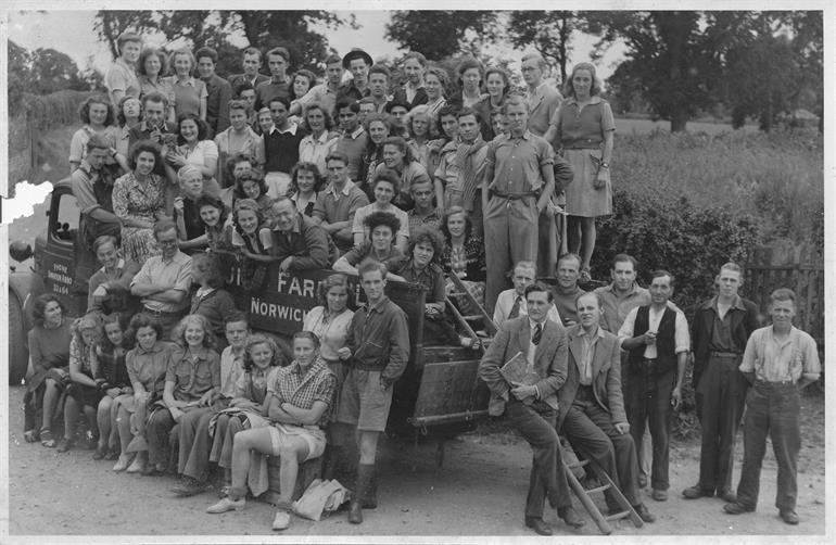 Photograph. Foreign students on Westwick Fruit Farms (North Walsham Archive).