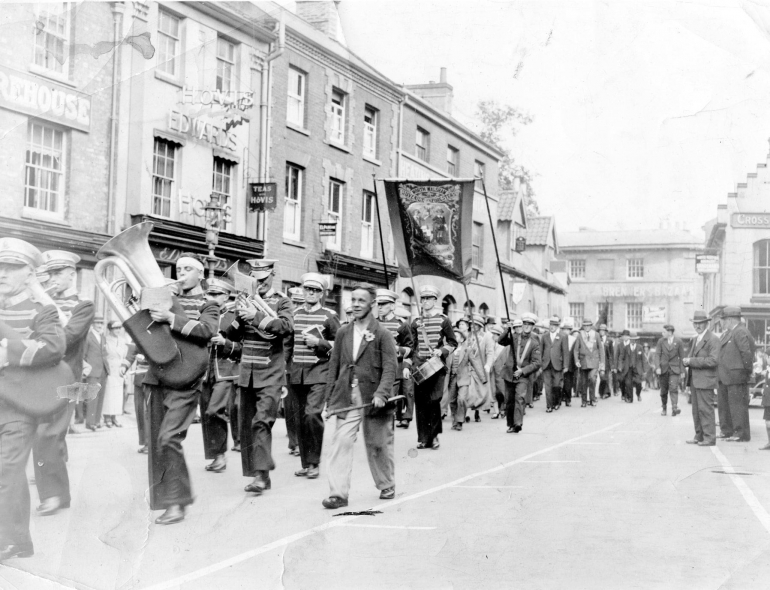 Photograph. Friendly Societies procession through North Walsham Market Place (North Walsham Archive).