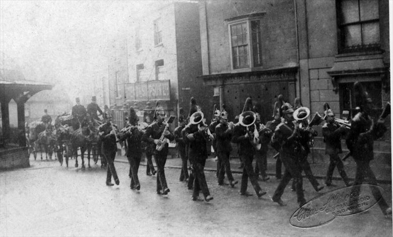 Funeral Cortege in North Walsham Market Place. King's Own Royal Regement Norfolk Imperial Yeomanry. (North Walsham Archive) Photograph. Funeral Cortege in North Walsham Market Place. King's Own Royal Regement Norfolk Imperial Yeomanry. (North Walsham Archive).