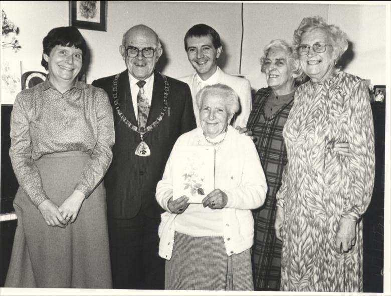 Photograph. Good Companions Club celebrate the 100th birthday of one of its members (North Walsham Archive).