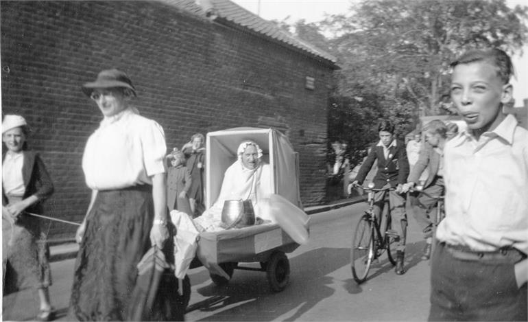 Photograph. Grammar School Road Procession in the 1940s (North Walsham Archive).