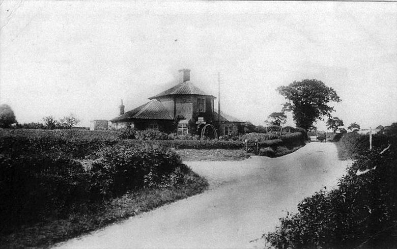 Photograph. Hanworth Post Office on the Aylsham to Cromer Road. (North Walsham Archive).