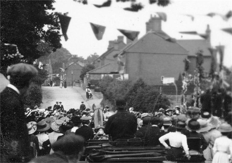 Photograph. The King George V Coronation celebrations 1911 in North Walsham outside Manor Road School. (North Walsham Archive).