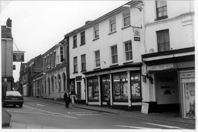 Photograph. Kings Arms Street & corner of Market Place, showing Card Scene and Lloyds Bank. (North Walsham Archive).