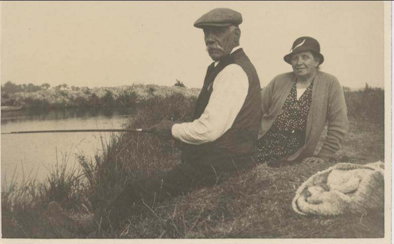 Photograph. Laurence and Selina Maclean fish the Dilham Canal (North Walsham Archive).