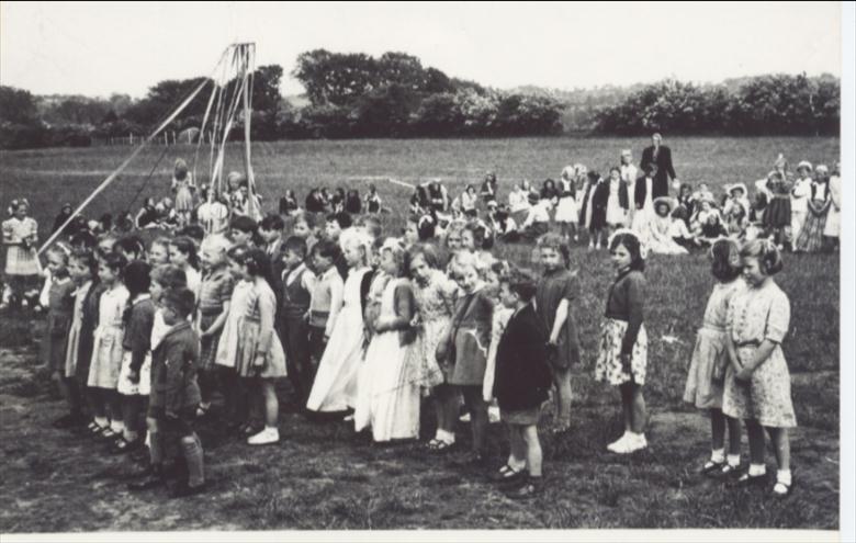 Photograph. May Day celebrations at Manor Road Junior School, 1949. (North Walsham Archive).
