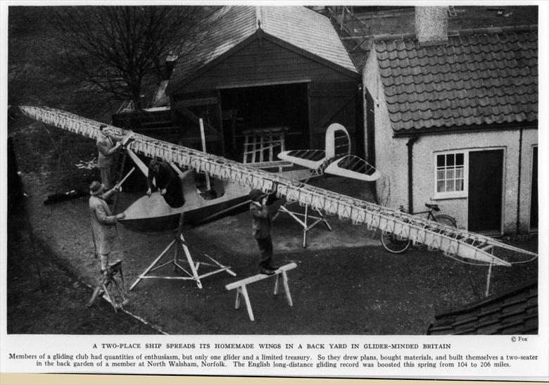 Photograph. Members of the North Walsham Gliding Club constructing a glider somewhere in North Walsham (North Walsham Archive).