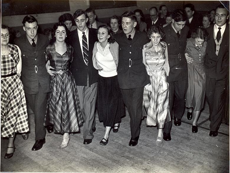 Photograph. Mundesley Women's Institute Party Coronation Hall. S. Earl, B.Bates, J.Ketteringham, ?, C. Williams, L. Allen, R. Taylor, J. Frost, Y. Ward, ?. (North Walsham Archive).