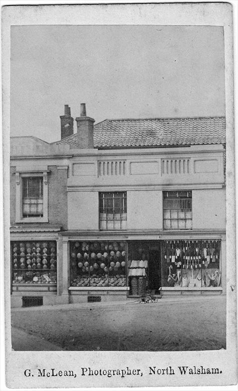 Photograph. North Side Market Place, North Walsham. Bullimore's in old Chamberlain's Shop. Photo G.McLean (North Walsham Archive).