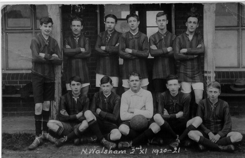 Photograph. North Walsham 2nd XI football team outside Paston School Pavillion, Norwich Road. (North Walsham Archive).