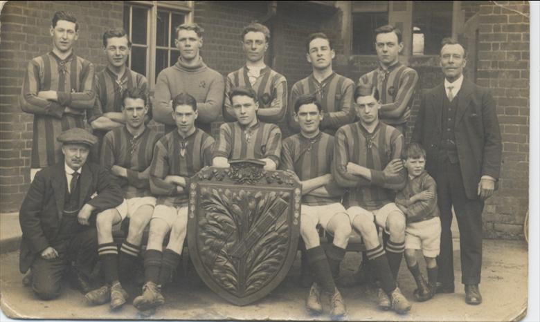 Photograph. North Walsham Football Team winning the Charity Shield. (North Walsham Archive).