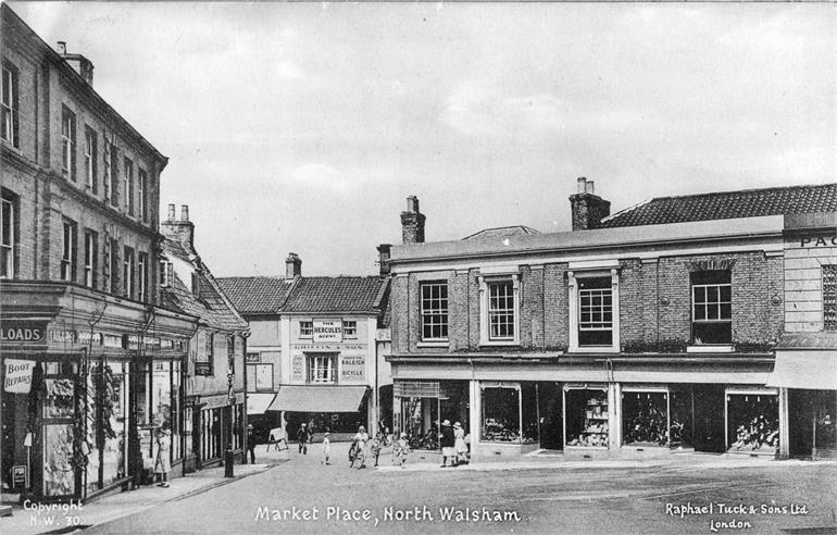 Photograph. North Walsham Market Place and Market Cross (North Walsham Archive).