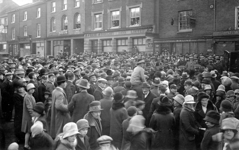 Crowd for North Walsham's first motor ambulance in Market Place (North Walsham Archive) Photograph. Crowd for North Walsham's first motor ambulance in Market Place (North Walsham Archive).