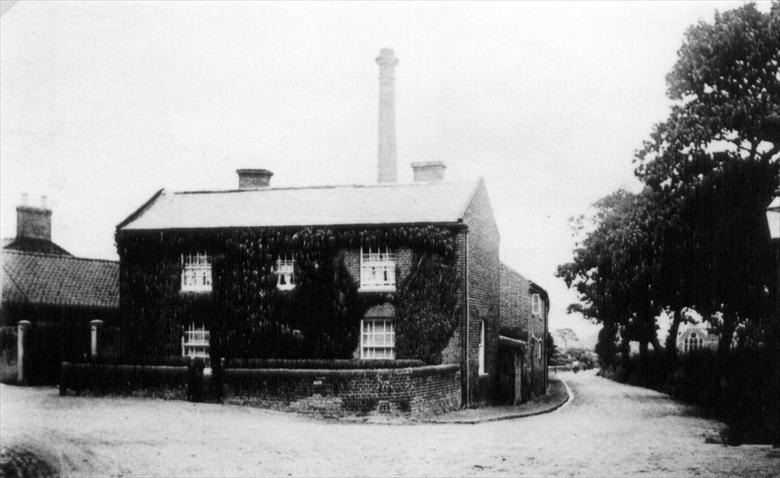 Photograph. Park Hall Cottage, New Road, North Walsham. Looking north down Pound Road. (North Walsham Archive).