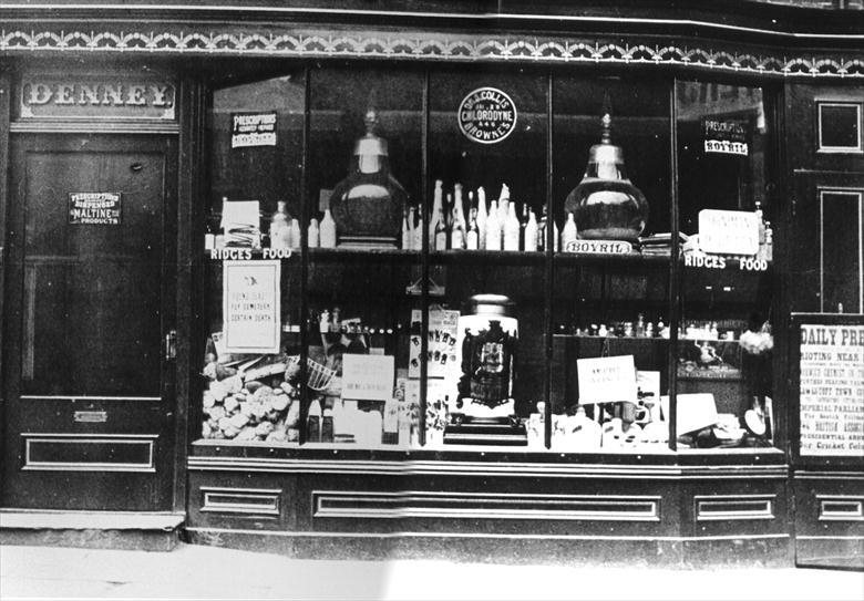 Photograph. The Pharmacy, at 13 Market Place, North Walsham, was run by E.J.Denney from 1869 - 1906 when it became "Lings" until 1974. (North Walsham Archive).