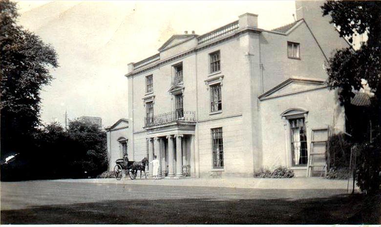 Photograph. Pony and trap outside The Oaks, North Walsham (North Walsham Archive).