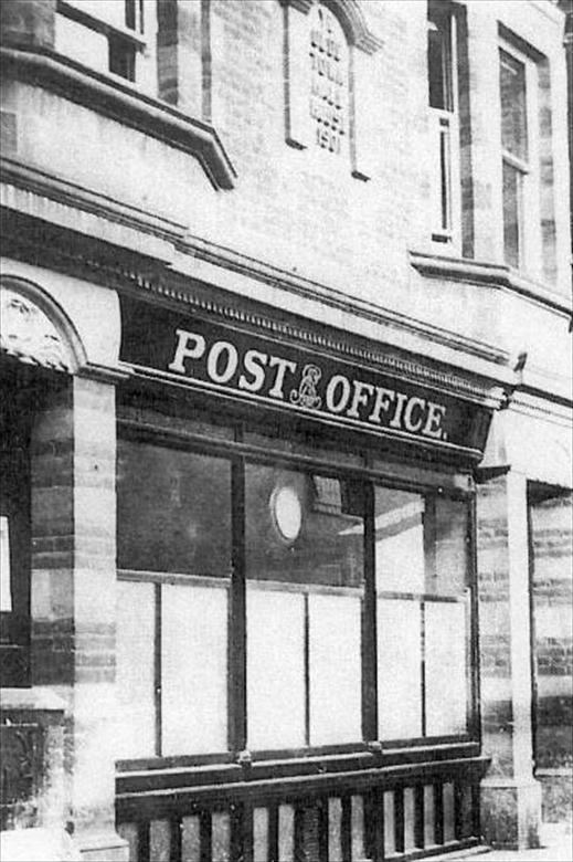 Photograph. The Post Office occupied the "Old Town Hall" in King's Arms Street between 1908 and 1966. (North Walsham Archive).