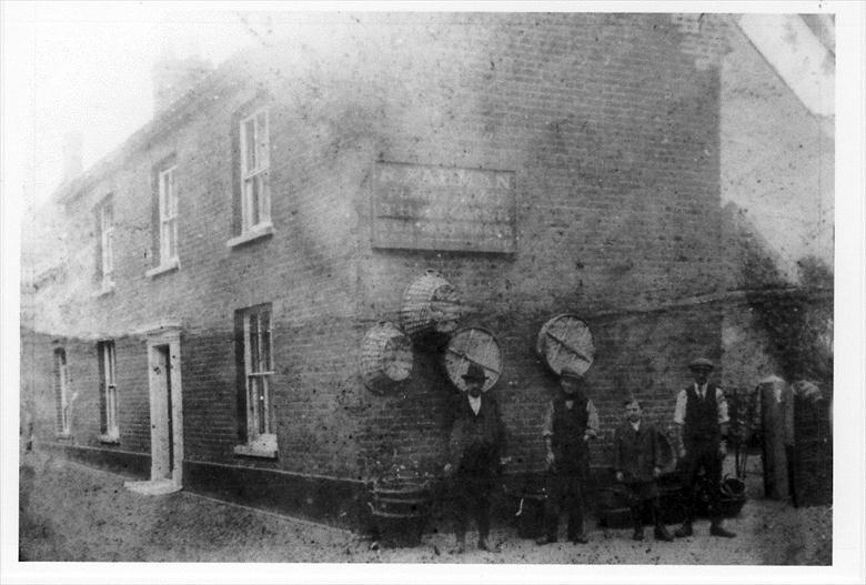Photograph. R.Farman, Garden House, Aylsham Road, North Walsham. "Plain & Fancy Thatcher & Basketmaker" (North Walsham Archive).