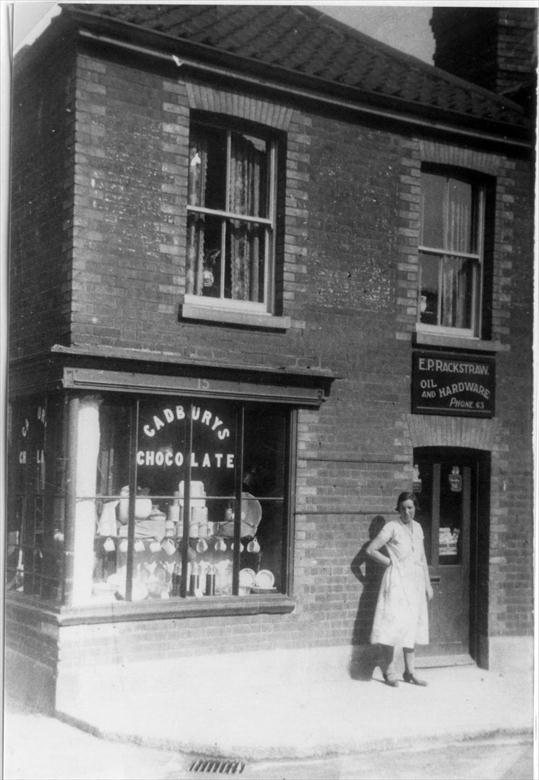 Photograph. Rackstraw's Oil & Hardware, 15 Mundesley Road, North Walsham. Mrs Violet Wesby lived in the flat above, with husband Bertie, until 1939 (North Walsham Archive).