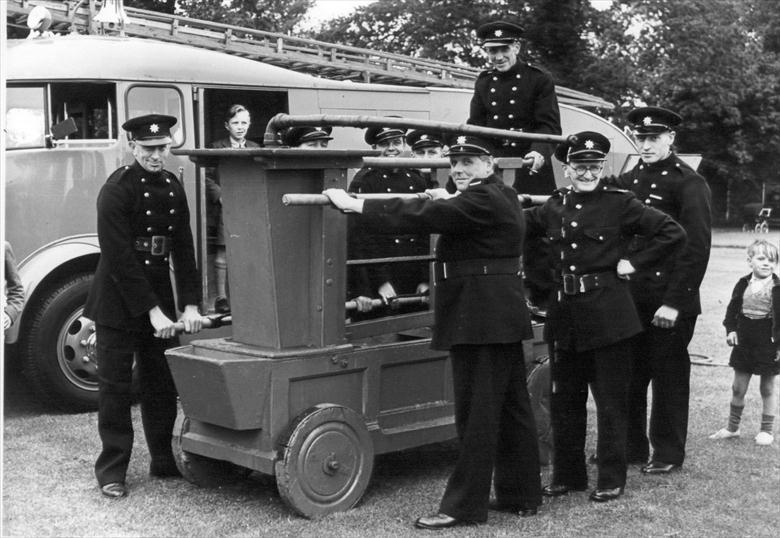 The rebuilt North Walsham fire pump exhibited after its restoration by the Fire Service (North Walsham Archive) Photograph. The rebuilt North Walsham fire pump exhibited after its restoration by the Fire Service (North Walsham Archive).