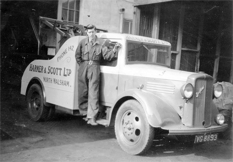 Photograph. Ronnie Drake and the Bedford Breakdown Truck at Harmer & Scott Ltd Garage (North Walsham Archive).
