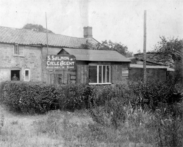 Photograph. Sid Salmon's first Cycle shop down Cats Pit Lane (North Walsham Archive).