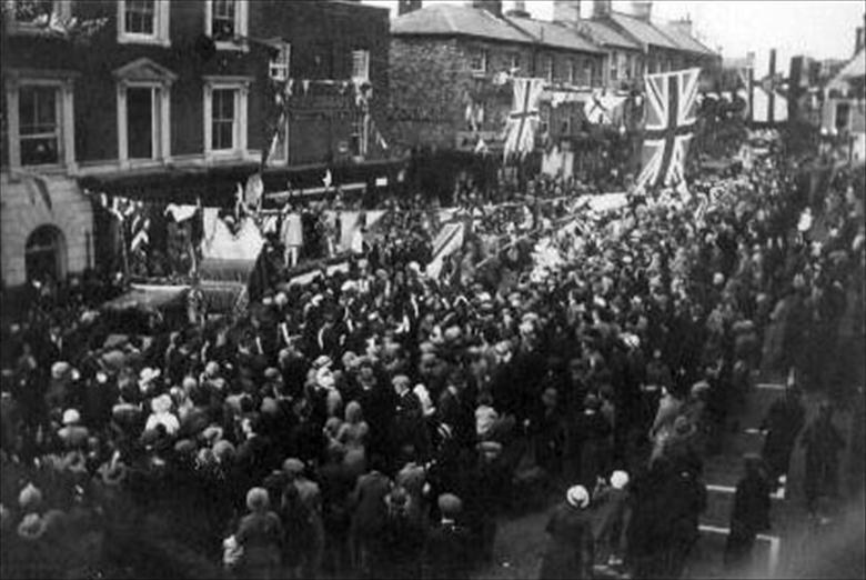 Photograph. Silver Jubillee celebrations in the North Walsham Market Place. (North Walsham Archive).