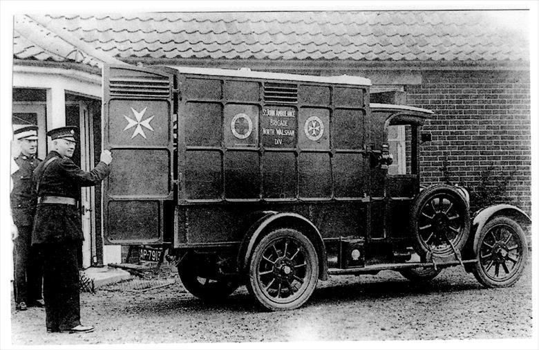 Photograph. St John's First motorised Ambulance - outside the North Walsham Cottage Hospital. (North Walsham Archive).