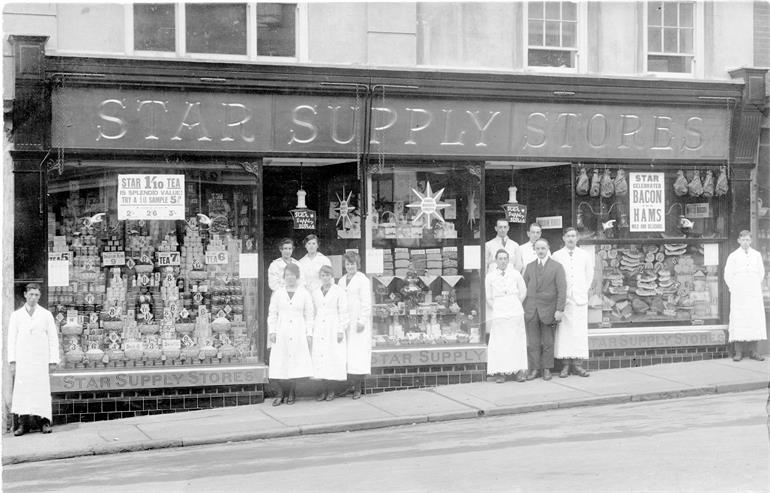 Photograph. Star Supply Stores in North Walsham Market Place. (North Walsham Archive).