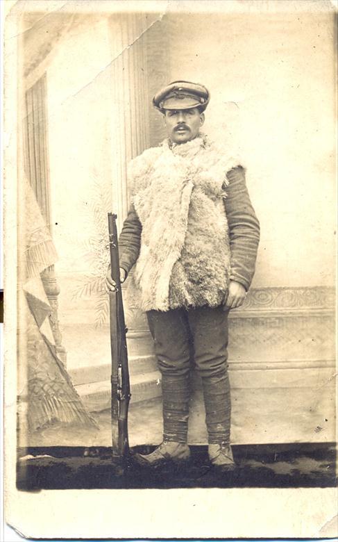 Photograph. Tom Henry; aged around 30, in the trenches during the first world war (North Walsham Archive).