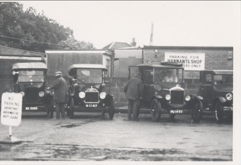 Photograph. Vintage cars on display outside Hannant's on Bacton Road. (North Walsham Archive).