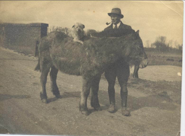 Photograph. William Dixon on Royston Bridge. (North Walsham Archive).